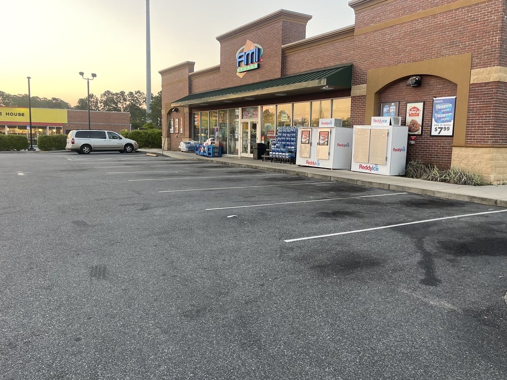 AMI CONVENIENT STORE / EXXON Updated September 2024 23208 Front