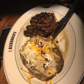 J. Alexander's - Steak with loaded potato - New American Near Me - Raleigh, North Carolina J. Alexander's - Steak with loaded potato - New American Near Me - Raleigh, North Carolina