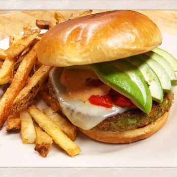 Lincoln Station - Our veggie burger topped with Swiss cheese,roasted red peppers, avocados and our house sauce. Accompanied with our house cut fries. - American Near Me - Chicago, Illinois Lincoln Station - Our veggie burger topped with Swiss cheese,roasted red peppers, avocados and our house sauce. Accompanied with our house cut fries. - American Near Me - Chicago, Illinois