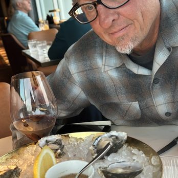 Sky Room - Hubs admiring the oysters. - American Near Me - Long Beach, California Sky Room - Hubs admiring the oysters. - American Near Me - Long Beach, California