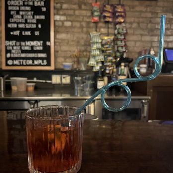 Meteor - a drink in a glass on a bar - Bars Near Me - Minneapolis, Minnesota
