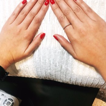 Kaylee Organic Nails & Spa - Left hand- Santa belt on ring finger. Right hand- Santa hat! - Nail Salons Near Me - Burbank, California