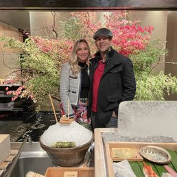 They were gracious enough to take a photo of us after our meal, behind the preparation station!
