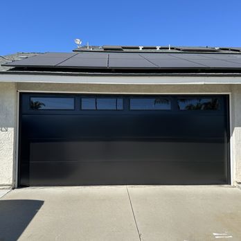 Premier Garage Doors & Gates - Black smooth modern door. - Garage Door Services Near Me - Anaheim, California Premier Garage Doors & Gates - Black smooth modern door. - Garage Door Services Near Me - Anaheim, California