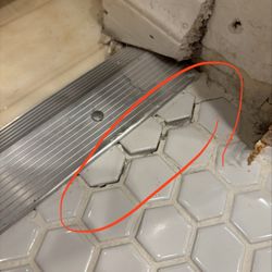 Caesar's Appliance Sales & Service - Broken tiles after pushing stack washer dryer into closet
