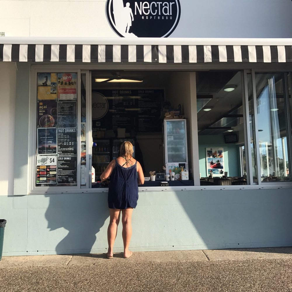 Nectar Espresso - Window for ordering and pickup, menu on the left hand side. - Coffee & Tea Near Me - Miami, QLD