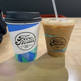 12 oz Americano (left) and 12 oz Iced Latte w/ almond mill (right) 12 oz Americano (left) and 12 oz Iced Latte w/ almond mill (right)