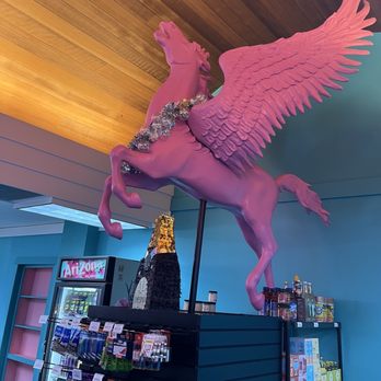 Sweet Spot Market - Interior view of unicorn statue inside the market - Convenience Stores Near Me - Santa Rosa, California Sweet Spot Market - Interior view of unicorn statue inside the market - Convenience Stores Near Me - Santa Rosa, California