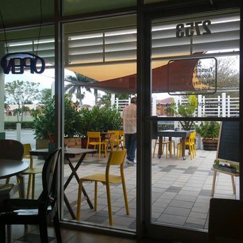 Café Bea - Outdoor patio, i think thats the owner. - Cafes Near Me - Miami, Florida Café Bea - Outdoor patio, i think thats the owner. - Cafes Near Me - Miami, Florida
