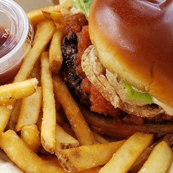 Holoholo Grill - Wagyu Burger. My husband enjoyed this immensely. Says bun was fresh and soft, patty was moist and juicy and fries were freshly cooked. - Hawaiian Near Me - Koloa, Hawaii