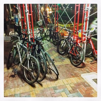 Lilly & Bloom - Bikes outside on scaffolding - Cocktail Bars Near Me - Houston, Texas