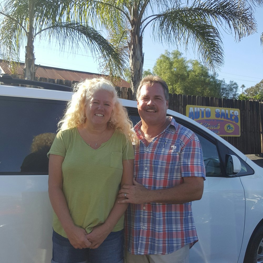 Fallbrook Motors - Such a great couple. They are in front of a new Van they went out and bought for a customer who was seeking something they didn't have. :) - Used Car Dealers Near Me - Fallbrook, California Fallbrook Motors - Such a great couple. They are in front of a new Van they went out and bought for a customer who was seeking something they didn't have. :) - Used Car Dealers Near Me - Fallbrook, California