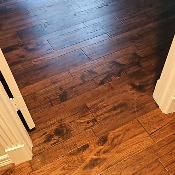 Flooring Warehouse - Doorway transition from existing hardwood to new flooring - Flooring Near Me - Houston, Texas Flooring Warehouse - Doorway transition from existing hardwood to new flooring - Flooring Near Me - Houston, Texas