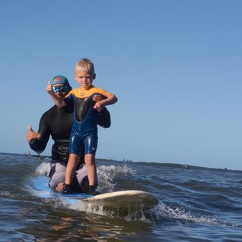 Waves Hawaii Surf School - My 4 year old was so cautious and nervous to try surfing, but Carlos bonded with him and they rode the waves! - Paddleboarding Near Me - Kihei, Hawaii