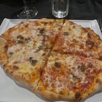 Stella's Restaurant & Catering - Sausage pizza - Italian Near Me - Lubbock, Texas Stella's Restaurant & Catering - Sausage pizza - Italian Near Me - Lubbock, Texas