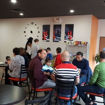 Coffeelicious Coffee Shop - people sitting at tables - Coffee & Tea Near Me - Burnaby, British Columbia Coffeelicious Coffee Shop - people sitting at tables - Coffee & Tea Near Me - Burnaby, British Columbia