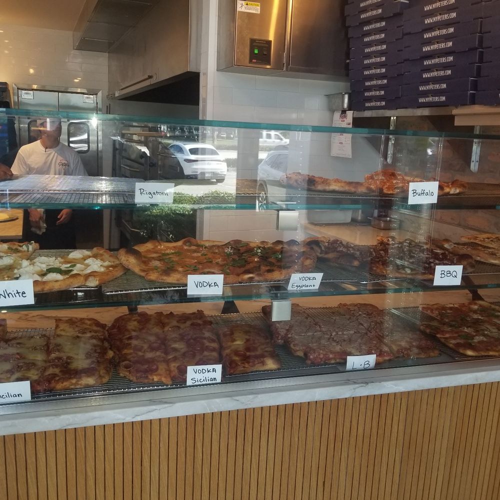 Peter’s Pizzeria - Pizza case - Pizza Near Me - Pompano Beach, Florida Peter’s Pizzeria - Pizza case - Pizza Near Me - Pompano Beach, Florida