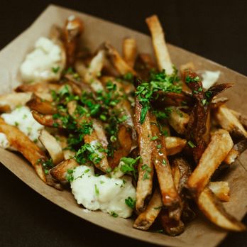 The Crypt - a tray of french fries and mashed potatoes - Dive Bars Near Me - Denver, Colorado