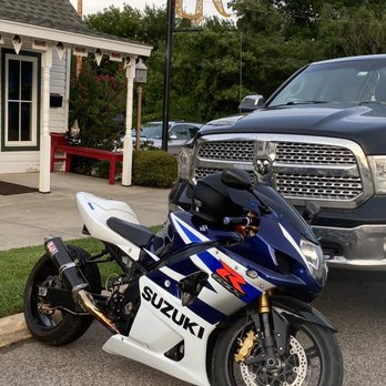 The Black Raven - a police motorcycle parked in front of a house - Irish Pub Near Me - Harrah, Oklahoma The Black Raven - a police motorcycle parked in front of a house - Irish Pub Near Me - Harrah, Oklahoma