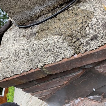 Red Rock Roofing - BEFORE - Deteriorated chimney crown/cap - Roofing Near Me - Renton, Washington Red Rock Roofing - BEFORE - Deteriorated chimney crown/cap - Roofing Near Me - Renton, Washington