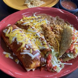 Fiesta Trio Ground beef burrito, with a crispy beef taco and a cheese enchilada. Fiesta Trio Ground beef burrito, with a crispy beef taco and a cheese enchilada.