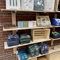The Maine Souvenir Shop - Some of our Hills and Trails shirts, some prints, cards, and stickers.