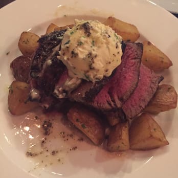 Swift's Attic - Heartbrand Texas Akaushi NY strip medium rare with a bleu cheese-choice-green peppercorn butter - New American Near Me - Austin, Texas Swift's Attic - Heartbrand Texas Akaushi NY strip medium rare with a bleu cheese-choice-green peppercorn butter - New American Near Me - Austin, Texas
