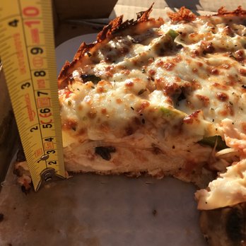 Denver Pizza Company - Crust is evenly thick throughout (about 1.5") - Pizza Near Me - Denver, Colorado Denver Pizza Company - Crust is evenly thick throughout (about 1.5") - Pizza Near Me - Denver, Colorado