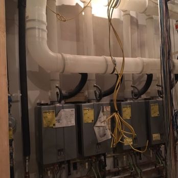 N C T Plumbing - New home tankless water heater rack - Plumbing Near Me - Fort Worth, Texas N C T Plumbing - New home tankless water heater rack - Plumbing Near Me - Fort Worth, Texas