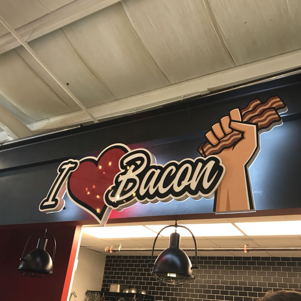I Love Bacon - a sign above a counter - Specialty Food Near Me - Cullman, Alabama I Love Bacon - a sign above a counter - Specialty Food Near Me - Cullman, Alabama
