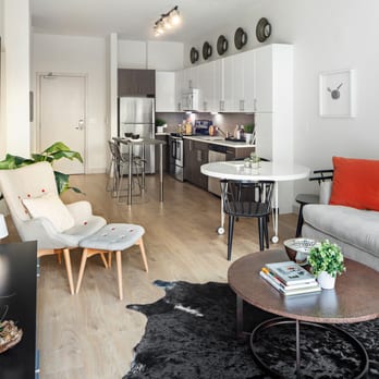 Fuse Cambridge - Open floor plan styles with stainless steel Energy Star appliances and white quartz kitchen countertops - Apartments Near Me - Cambridge, Massachusetts