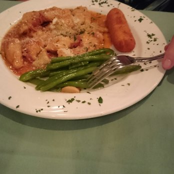 Casa Verde - Chicken with artichokes and garlic cooked in wine sauce. - Italian Near Me - Staten Island, New York Casa Verde - Chicken with artichokes and garlic cooked in wine sauce. - Italian Near Me - Staten Island, New York
