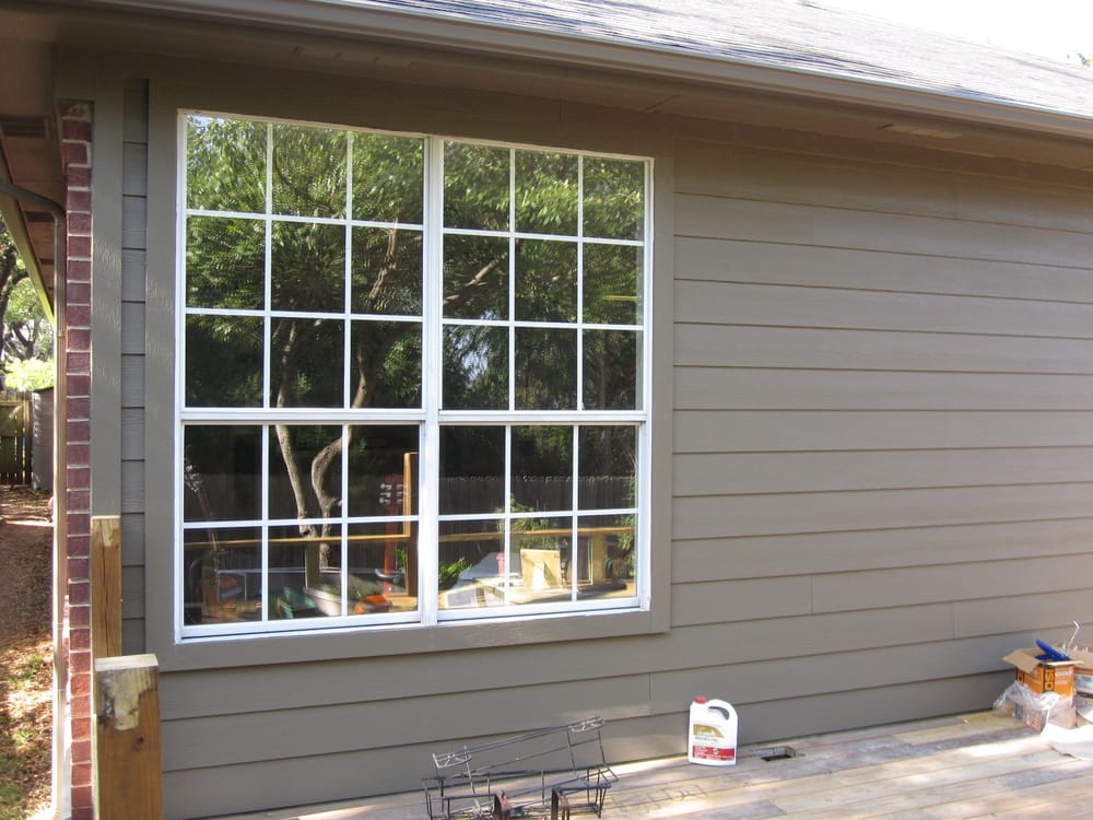 Slide of Titan Siding, Windows and Exteriors