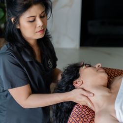 OC Therapeutic Massage - Providing targeted neck and shoulder relief for deep relaxation