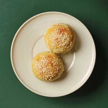 J'ai Feng - two sesame buns on a plate - Imported Food Near Me - Montreal, Quebec J'ai Feng - two sesame buns on a plate - Imported Food Near Me - Montreal, Quebec
