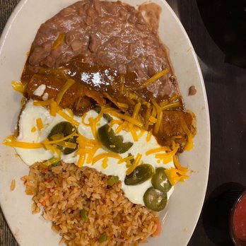 El Fenix - Sour cream, chicken enchilada, and a cheese enchilada with chili, con Carney rice, and beans my go to order every time I come - Mexican Near Me - Dallas, Texas El Fenix - Sour cream, chicken enchilada, and a cheese enchilada with chili, con Carney rice, and beans my go to order every time I come - Mexican Near Me - Dallas, Texas