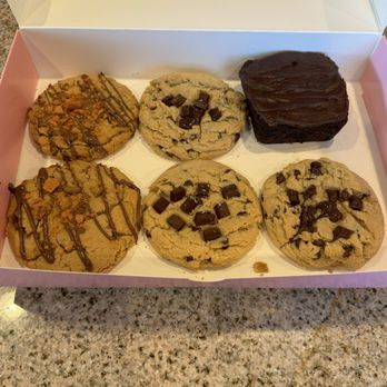 Crumbl - Durango - 6 Pack of Regular Size Cookies - Peanut Butter Cookies ft. Butterfinger. Semi-Sweet Chocolate Chunk Cookies. Double Fudge Brownie. - Bakeries Near Me - Las Vegas, Nevada Crumbl - Durango - 6 Pack of Regular Size Cookies - Peanut Butter Cookies ft. Butterfinger. Semi-Sweet Chocolate Chunk Cookies. Double Fudge Brownie. - Bakeries Near Me - Las Vegas, Nevada