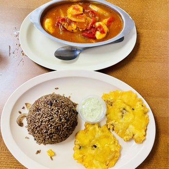 Tropical Beach Cafe - Shrimp in devil sauce (spicy tomato sauce) black bean rice (Moro) fried green plantains - Cuban Near Me - Miami Beach, Florida Tropical Beach Cafe - Shrimp in devil sauce (spicy tomato sauce) black bean rice (Moro) fried green plantains - Cuban Near Me - Miami Beach, Florida