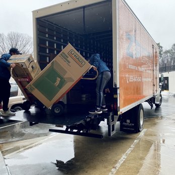 Zip Moving And Storage - Loading boxes - Movers Near Me - Rockville, Maryland Zip Moving And Storage - Loading boxes - Movers Near Me - Rockville, Maryland