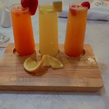 Cafe Mimosa - Flight of mimosa , strawberry, mango , and raspberry. - Breakfast & Brunch Near Me - Santa Rosa, California