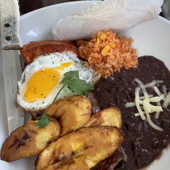 Amigos Taqueria Y Tequila - Carne Asada Tampiqueña Platter - adobo marinated steakwith sauteed onions & chorizo, plantains, rice, beans, and a fried egg! - Mexican Near Me - Westerly, Rhode Island Amigos Taqueria Y Tequila - Carne Asada Tampiqueña Platter - adobo marinated steakwith sauteed onions & chorizo, plantains, rice, beans, and a fried egg! - Mexican Near Me - Westerly, Rhode Island