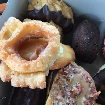 Mary's Donuts - How did this half broken donut even make it to the window display, let alone my box? - Donuts Near Me - Santee, California Mary's Donuts - How did this half broken donut even make it to the window display, let alone my box? - Donuts Near Me - Santee, California