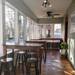 Enclosed Patio Seating Area at Reid's