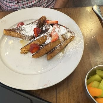Cafe Fleur De Lis - French toast and a side of fruit - Coffee & Tea Near Me - New Orleans, Louisiana Cafe Fleur De Lis - French toast and a side of fruit - Coffee & Tea Near Me - New Orleans, Louisiana