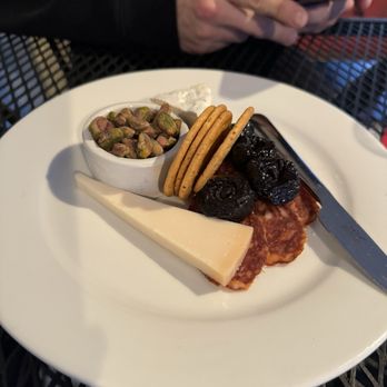 Embrace Calistoga - Cheese plate with cowgirl creamery Mt. Tam, goat Gouda, dried plums and pistachios - Bed & Breakfast Near Me - Calistoga, California Embrace Calistoga - Cheese plate with cowgirl creamery Mt. Tam, goat Gouda, dried plums and pistachios - Bed & Breakfast Near Me - Calistoga, California