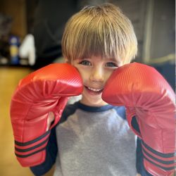 Practical Martial Arts - Check out the joy when a child puts on their first pair of boxing gloves!