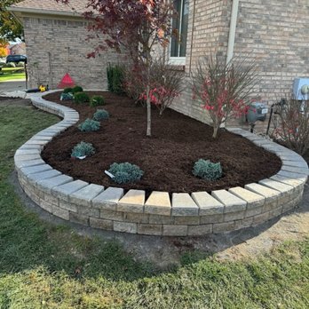 Peytom Maintenance - New wall, plants, and mulch installed last fall. Looks great! - Lawn Services Near Me - Macomb, Michigan Peytom Maintenance - New wall, plants, and mulch installed last fall. Looks great! - Lawn Services Near Me - Macomb, Michigan