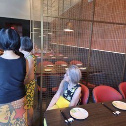 Empty tables with waiting guests.