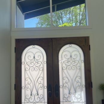 Blue Window Cleaner - Front of house from the inside. - Gutter Services Near Me - Winnetka , California Blue Window Cleaner - Front of house from the inside. - Gutter Services Near Me - Winnetka , California