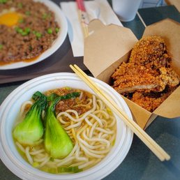 a bowl of noodles with meat and vegetables a bowl of noodles with meat and vegetables